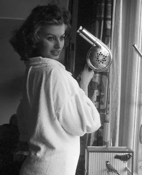 Italian actress Sophia Loren had her hair styled before the premiere of her film in 1956