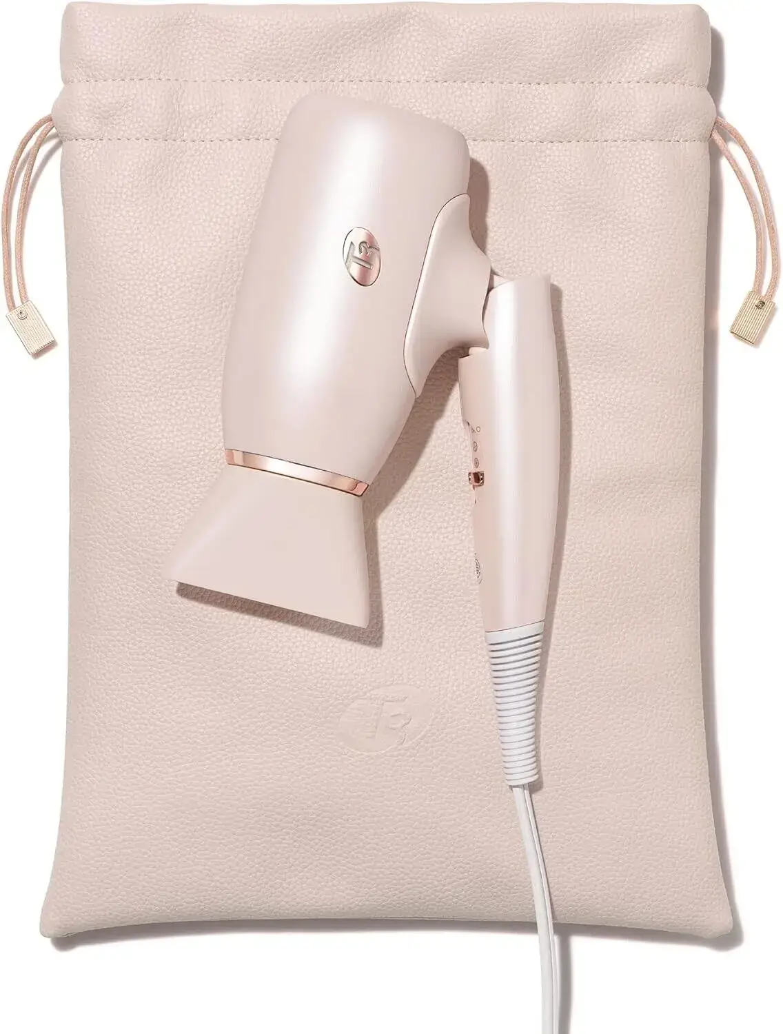 Elegant hair dryer with pouch on a beige background.