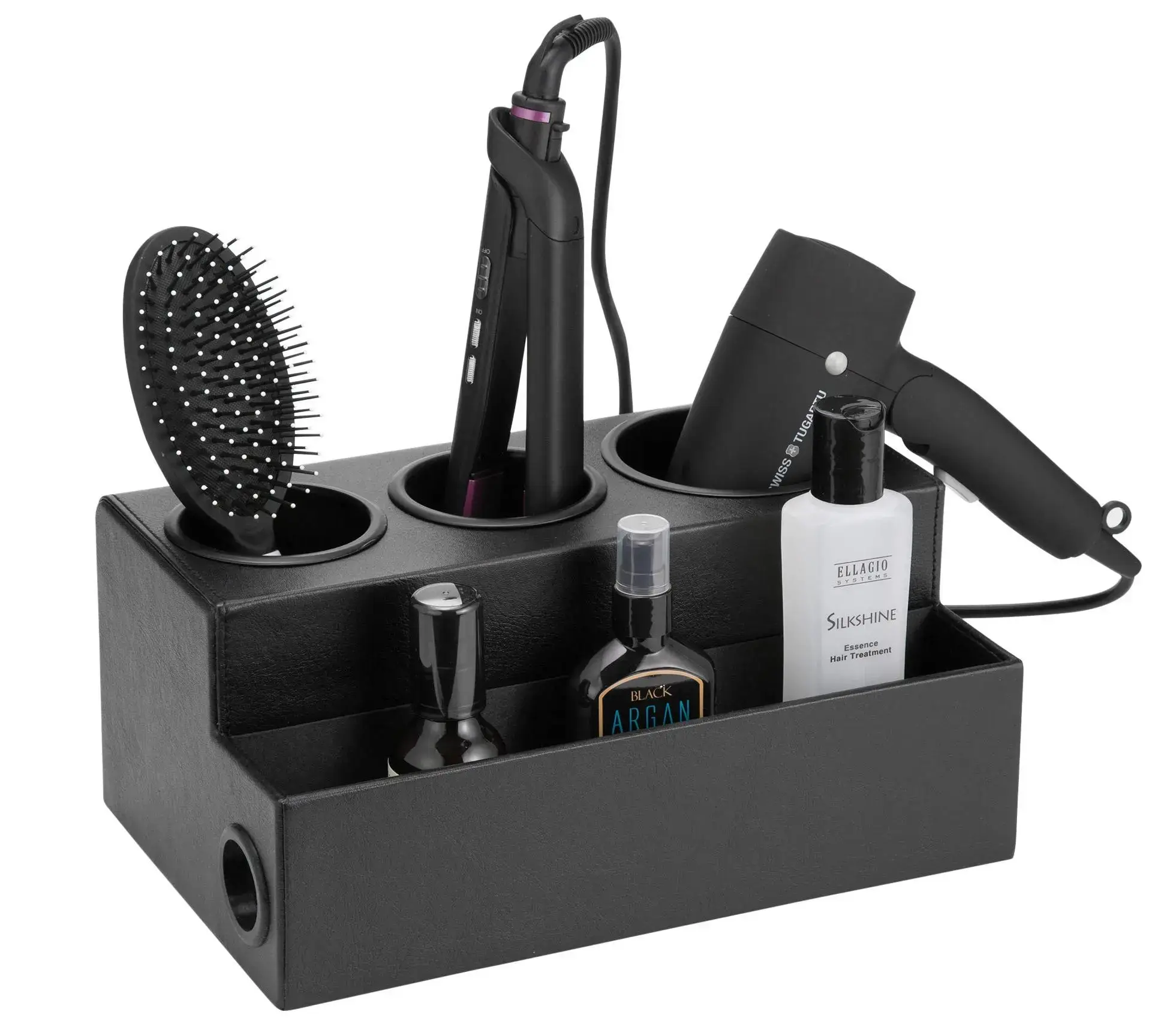 Hair dryer and styling tools organized in a black caddy.