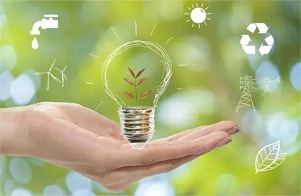 Hand holding lightbulb with plant, icons for sustainable energy around.