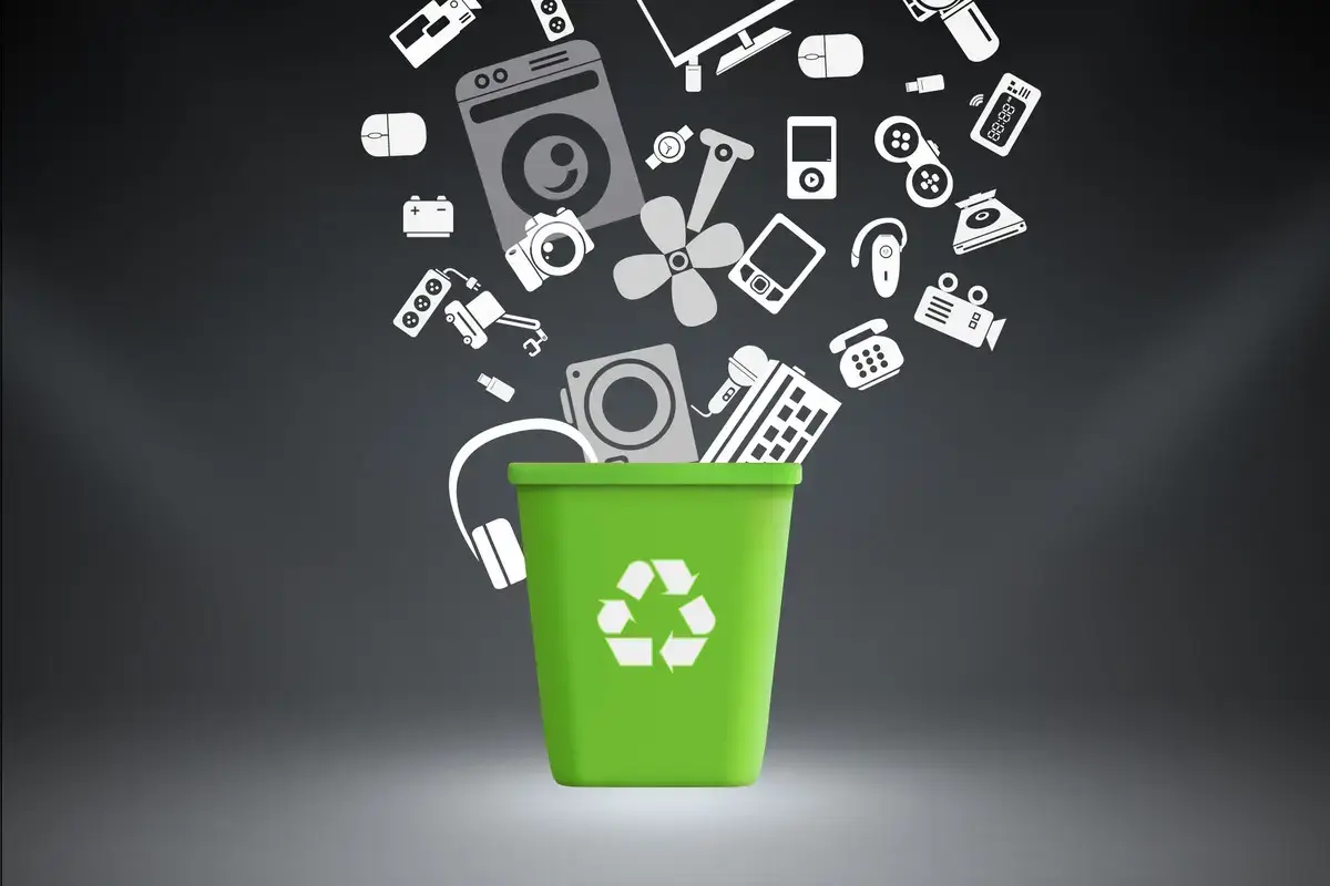 Electronic devices cascading into a recycling bin illustration.