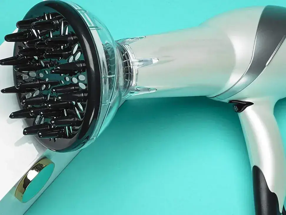 Hair dryer with diffuser attachment.