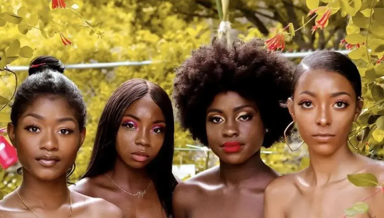 Four women showcasing diverse, beautiful hair textures.