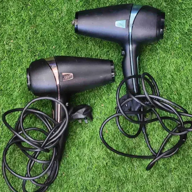 two hair dryers on grass