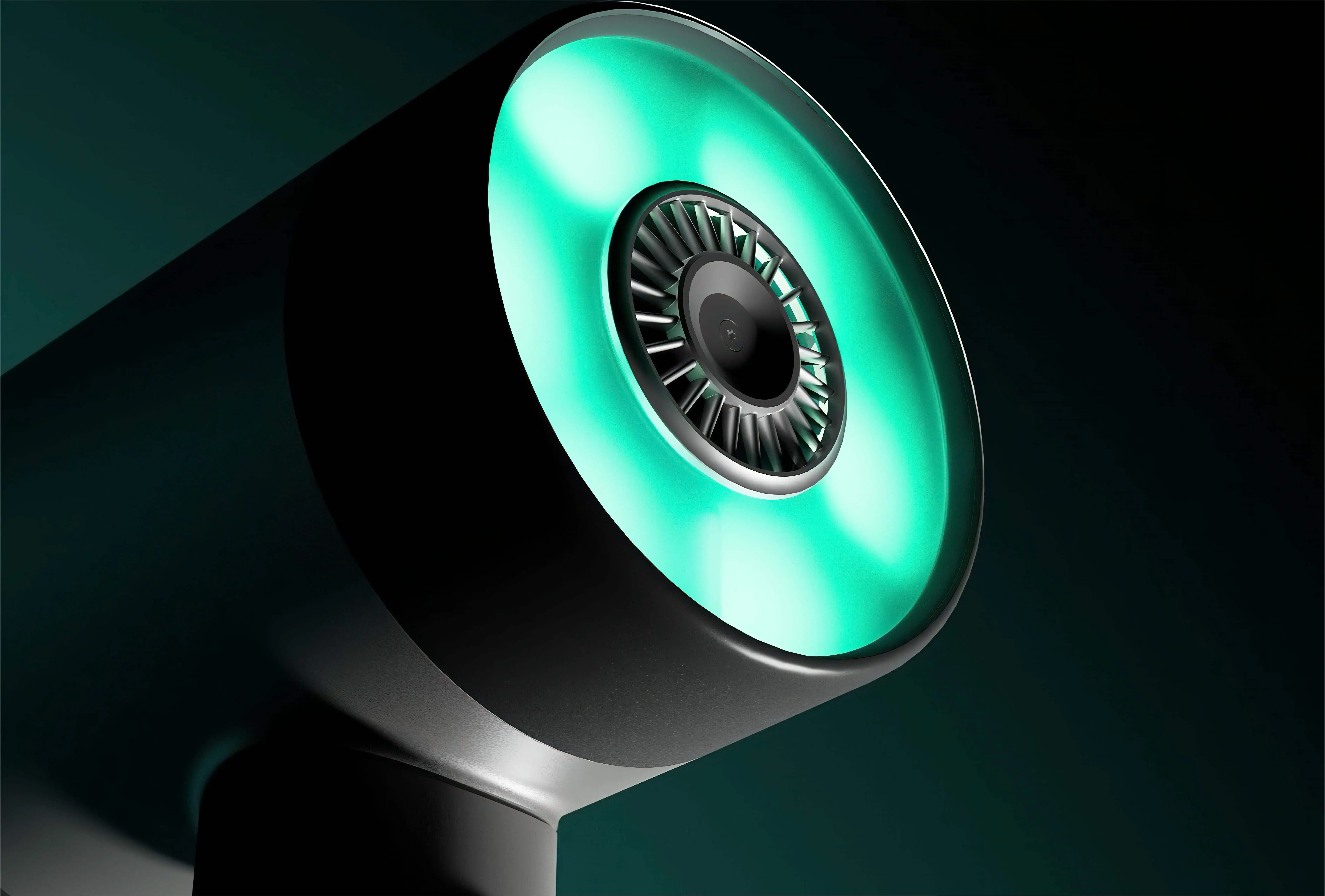 Close-up of hair dryer with innovative green-lit fan.